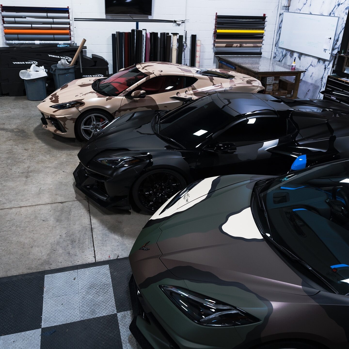 3 Corvettes with Camo Wraps